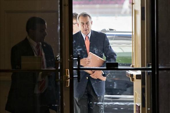 Speaker of the House John Boehner arrives at the Capitol in Washington, Saturday. There has been no sign of progress toward ending the government shutdown that has idled 800,000 federal workers and curbed services around the country. J. Scott Applewhite/AP