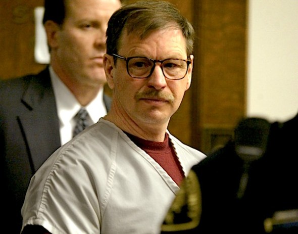 EATTLE - DECEMBER 18: Gary Ridgway prepares to leave the courtroom where he was sentenced in King County Washington Superior Court December 18, 2003 in Seattle, Washington. Ridgway received 48 life sentences, with out the possibility of parole, for killing 48 women over the past 20 years in the Green River Killer serial murder case. (Photo by Josh Trujillo-Pool/Getty Images)