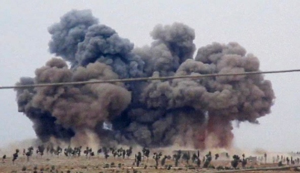Smoke rises after airstrikes in Kafr Nabel of the Idlib province, western Syria. Russian jets carried out a second day of airstrikes in Syria Thursday, but there were conflicting claims about whether they were targeting Islamic State and al-Qaeda militants or trying to shore up the defenses of President Bashar Assad. 