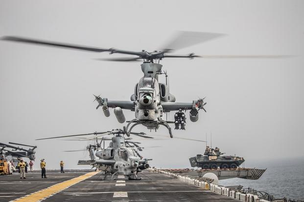 An AH-1Z Viper attached to Marine Medium Tiltrotor Squadron (VMM) 163 (Reinforced), 11th Marine Expeditionary Unit (MEU) takes off during a strait transit aboard the amphibious assault ship USS Boxer (LHD 4). (U.S. Marine Corps/Lance Cpl. Dalton S. Swanbeck)